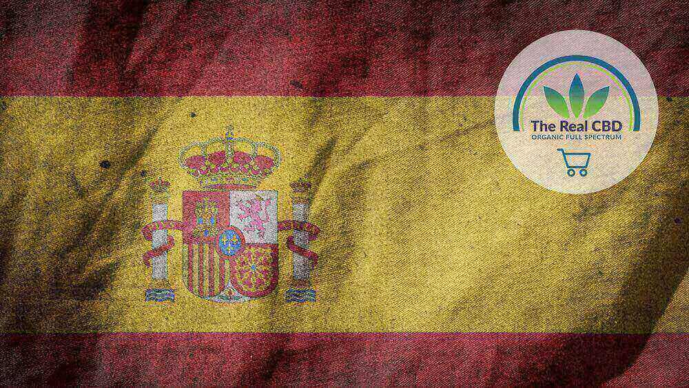 Spanish flag with The Real CBD logo