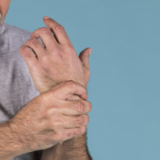 Man holding his wrist in pain