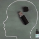 Outline of a head drawn on a blackboard with a USB stick inside.
