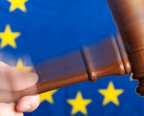 Judge's hammer over European flag