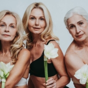 Middle-aged women holding white flowers