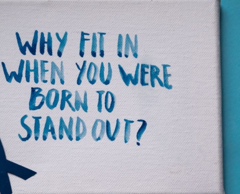Canvas with blue text: WHY FIT IN WHEN YOU WERE BORN TO STAND OUT