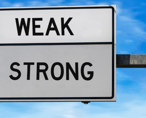 WEAK/STRONG road sign