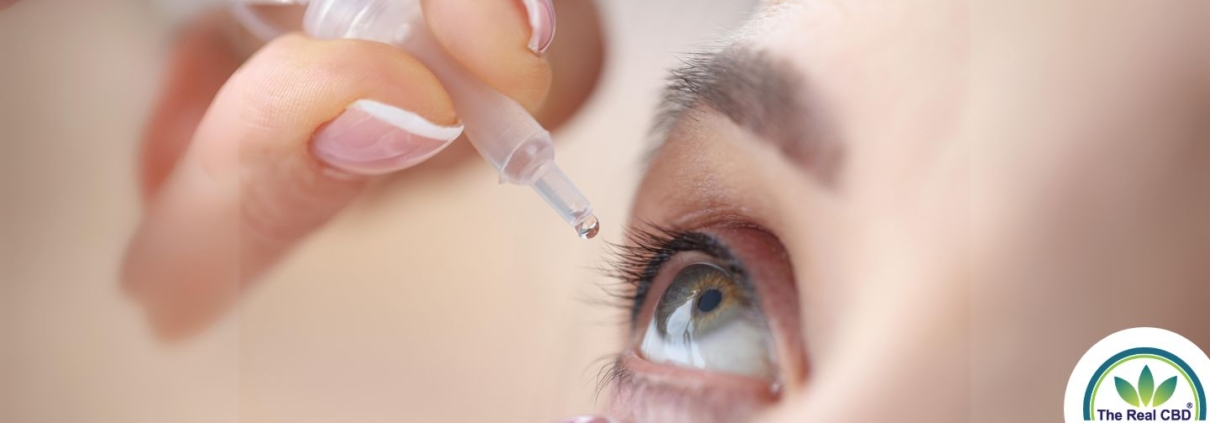 Woman dropping her eye with eye drops