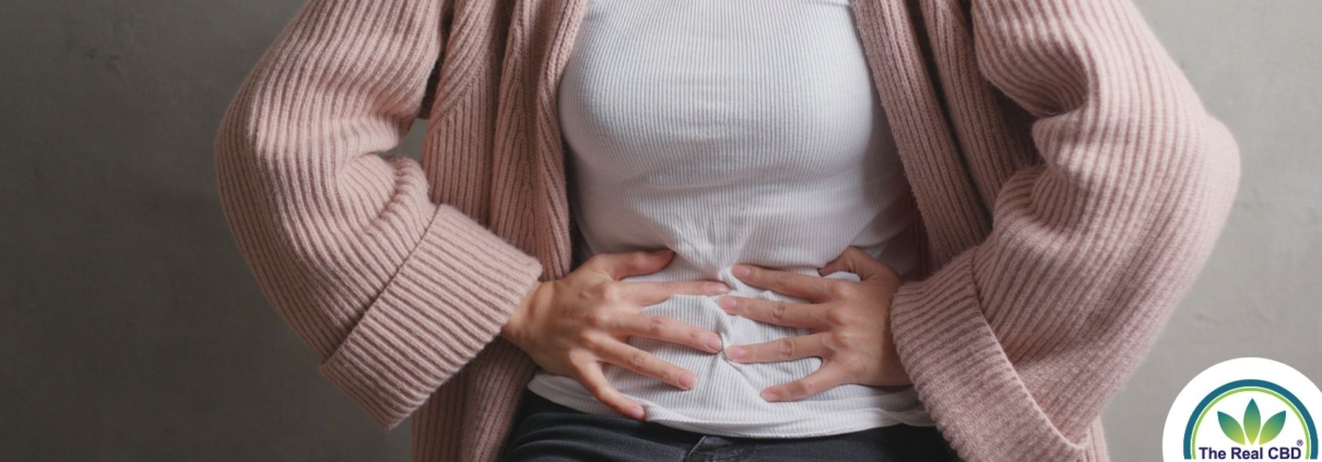 Woman holding her stomach