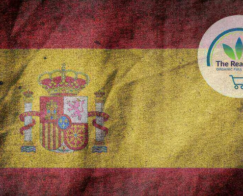 Spanish flag with The Real CBD logo