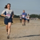 Runner arthlete on dirt track