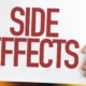 Hands holding SIDE EFFECT sign