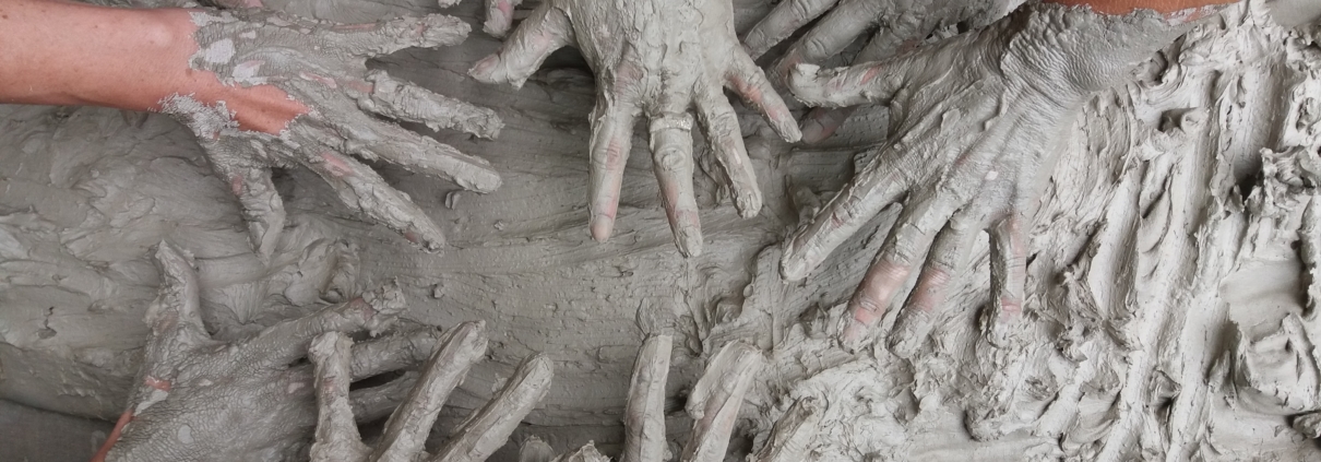 CBD Bentonite Clay hands in mudpile