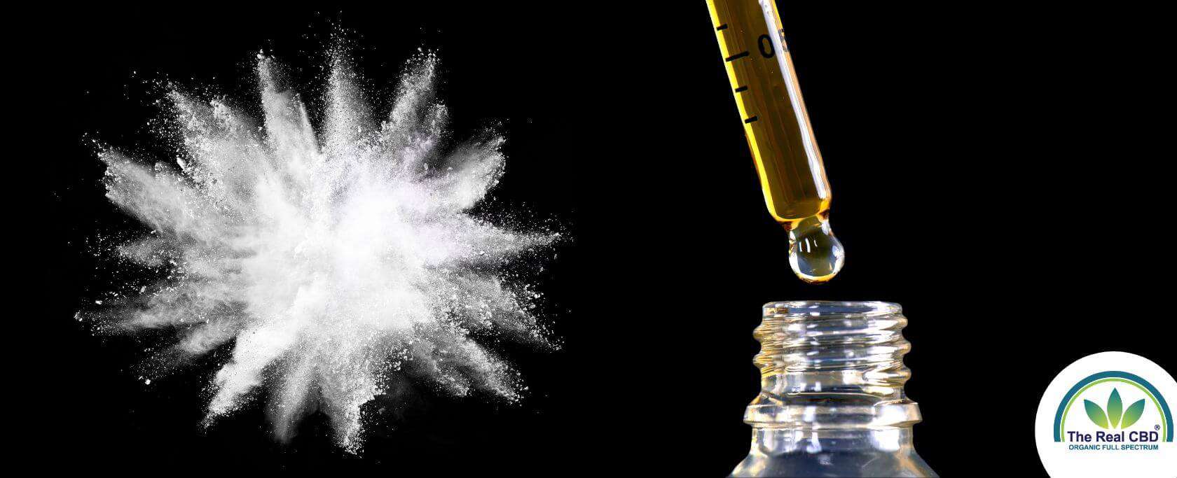 White powder explosion and CBD oil on black background