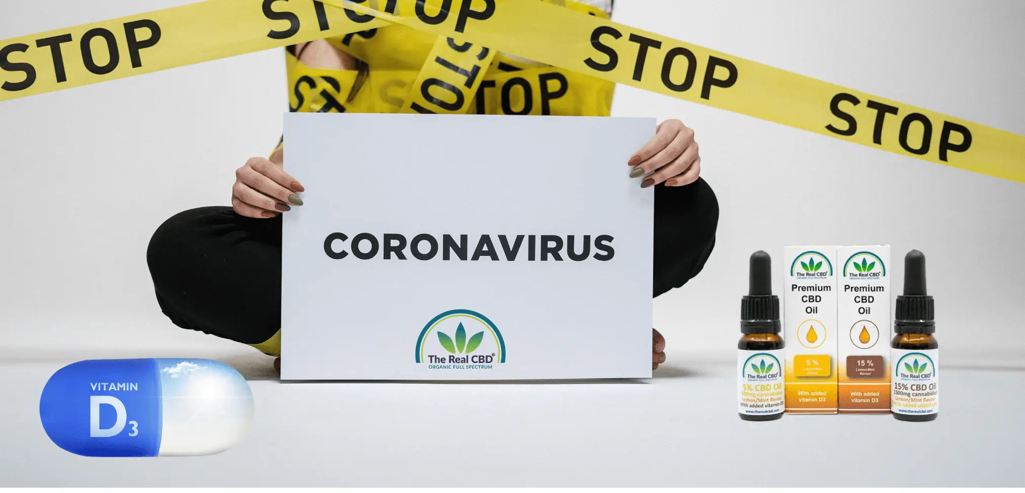 Coronavirus sign with vitamin D capsule and CBD oil