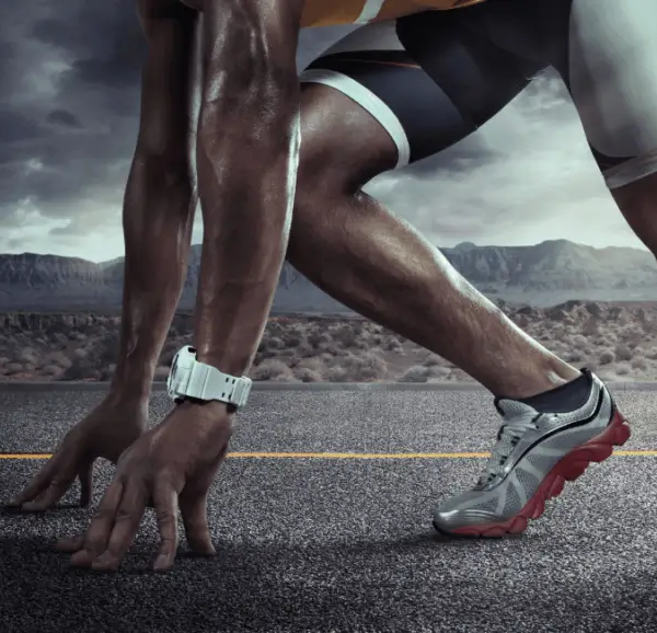 Runner starting on a tarmac road