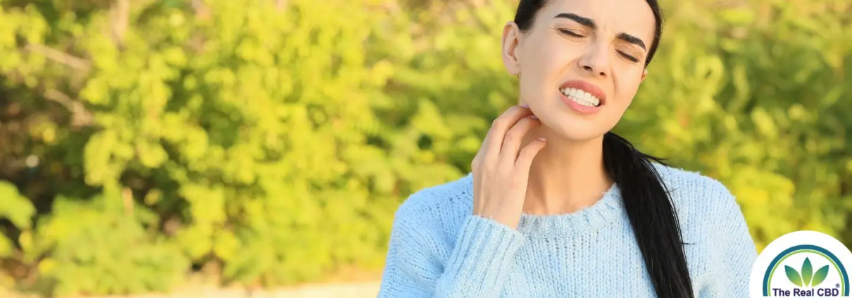 Woman itching her neck