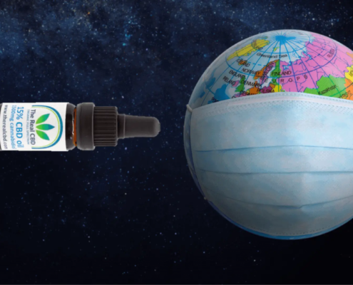 Globe with mask on and a CBD oil