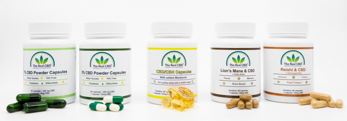 A row of different CBD capsules - The Real CBD Brand