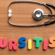 Bursitis plastic letters on a wooden table