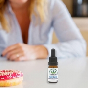 Woman reaching for a doughnut