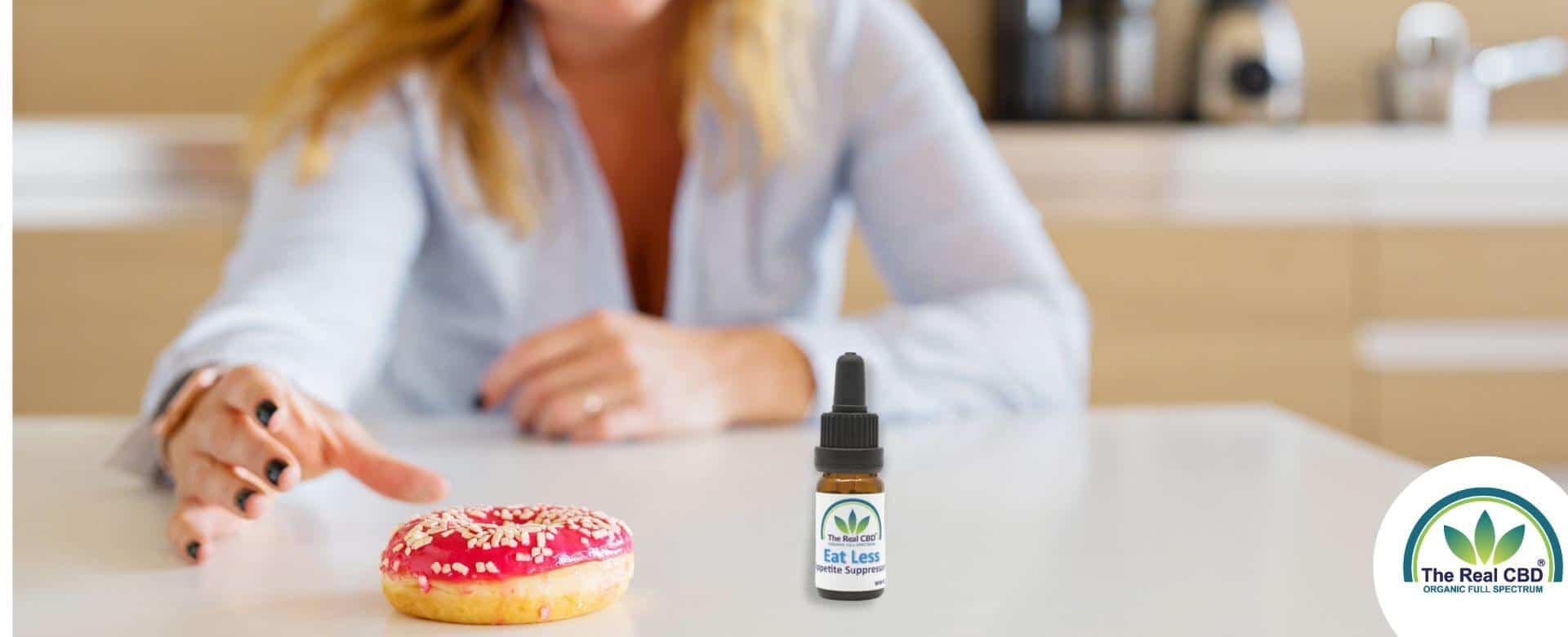 Woman reaching for a doughnut