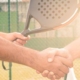 Padel players shaking hands