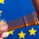 Judge's hammer over European flag