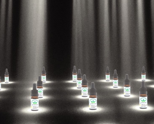 The Real CBD bottles in spotlight on stage