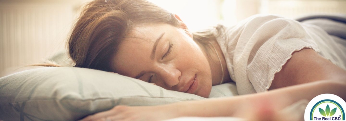 Sleeping woman's head on a pillow