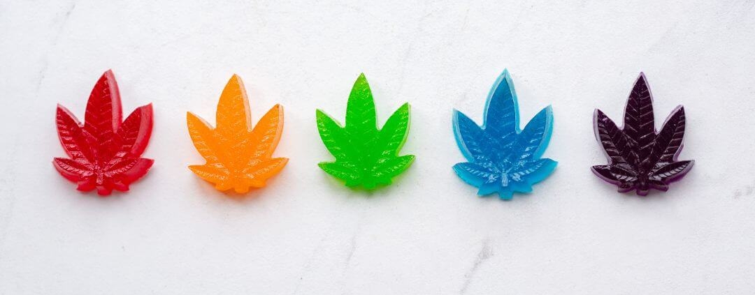 Hemp leaf shapes gummies in 5 different colours