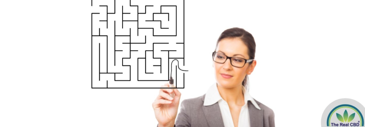 Woman start a maze with a black marker pen