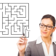 Woman start a maze with a black marker pen