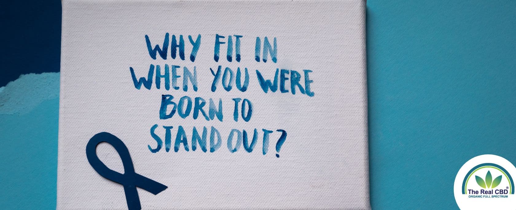 Canvas with blue text: WHY FIT IN WHEN YOU WERE BORN TO STAND OUT