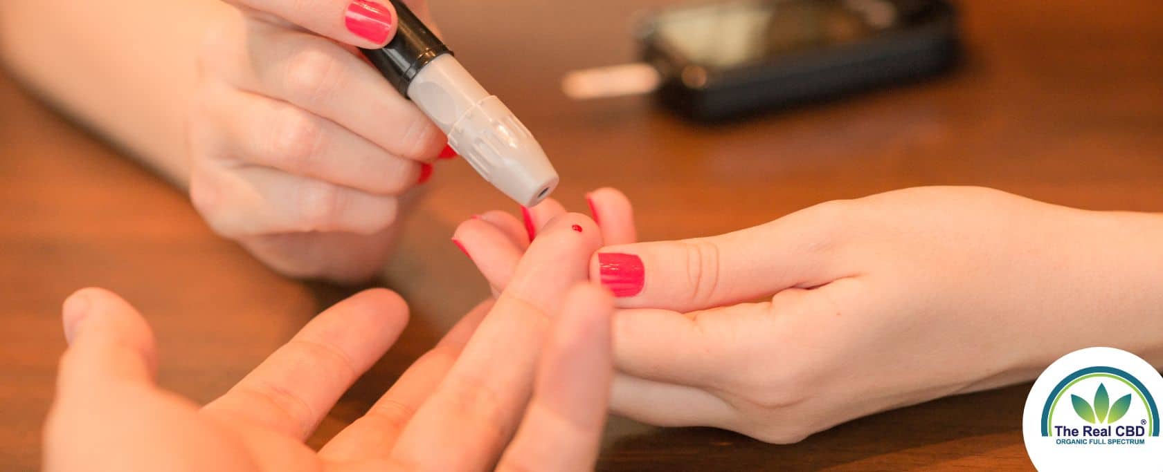 Woman doing a diabetes finger prick on a man