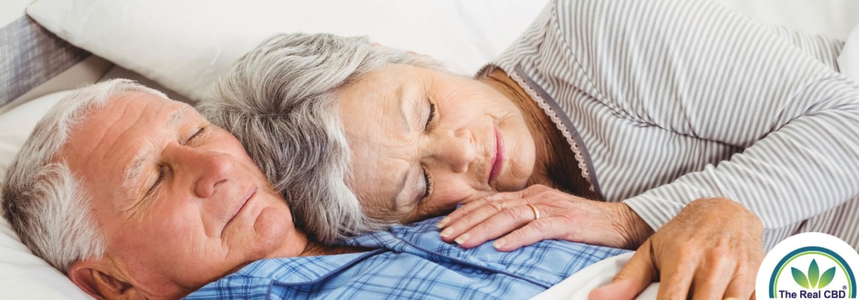 Old couple sleeping together