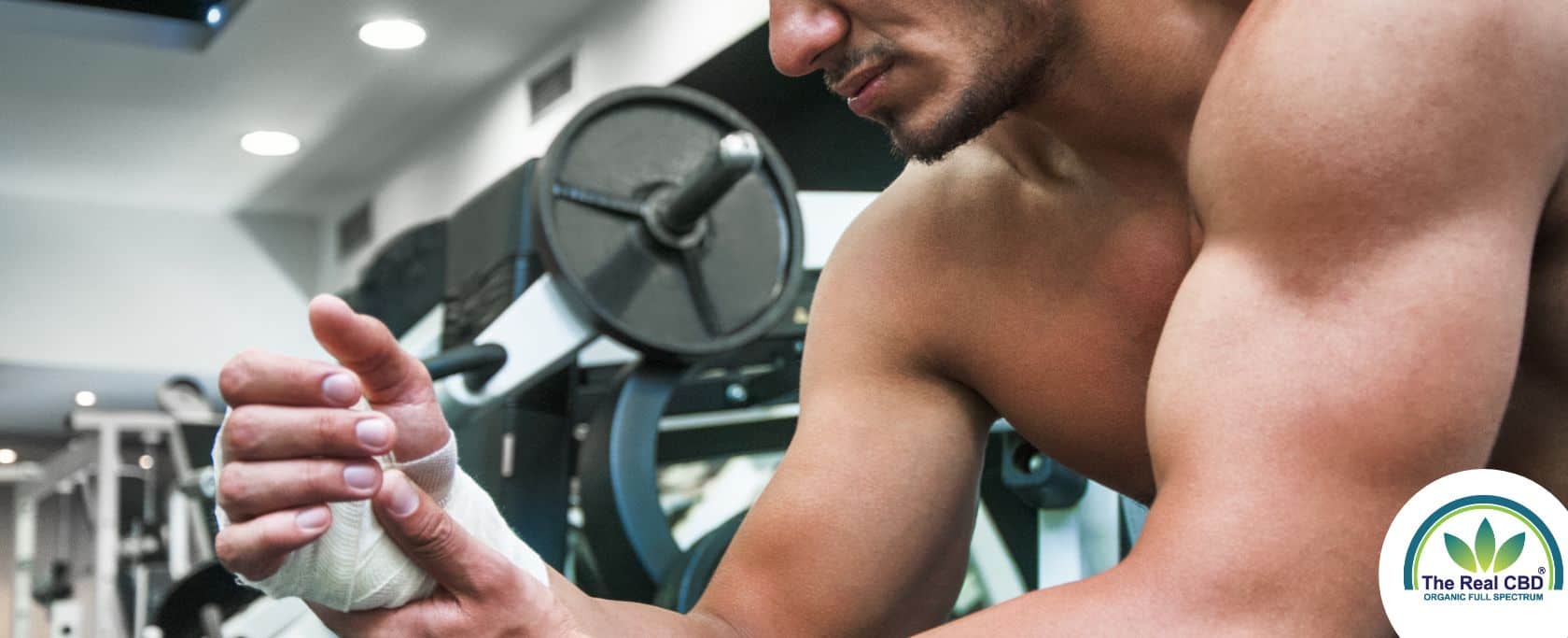 Injured man with bandage in a gym