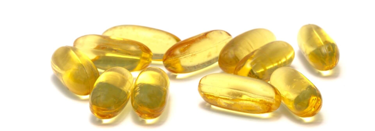 Yellow gel capsules close-up