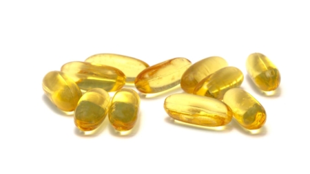 Yellow gel capsules close-up