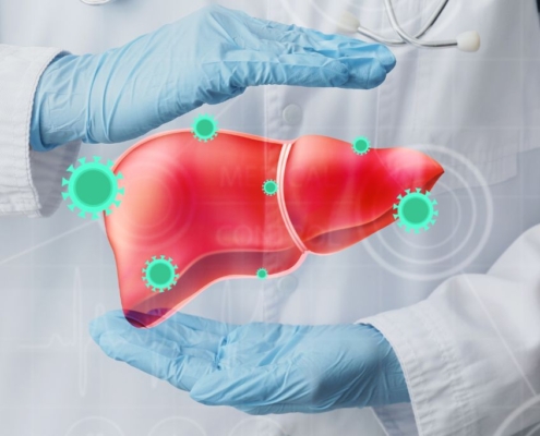 Gloved doctor framing a liver with his hands