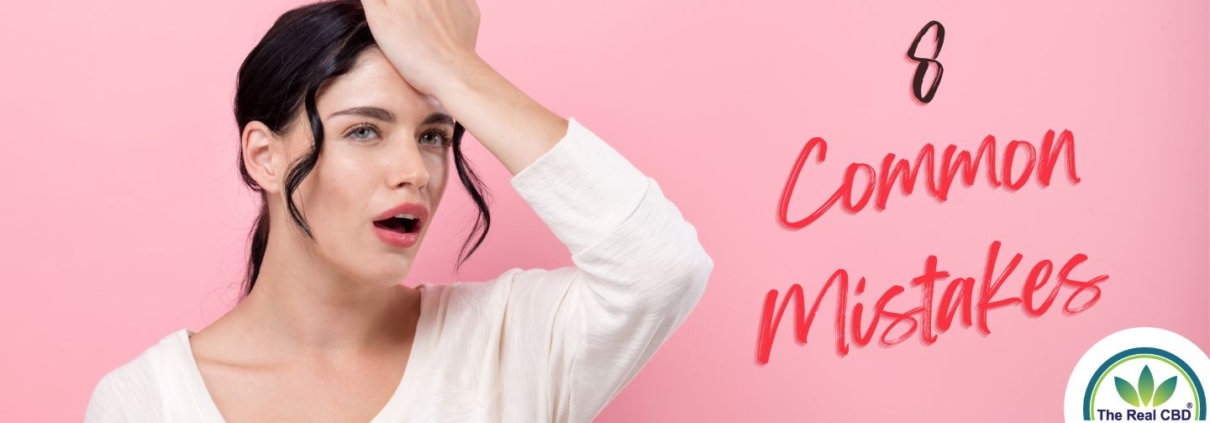 Woman holding her forehead with 8 common CBD mistakes