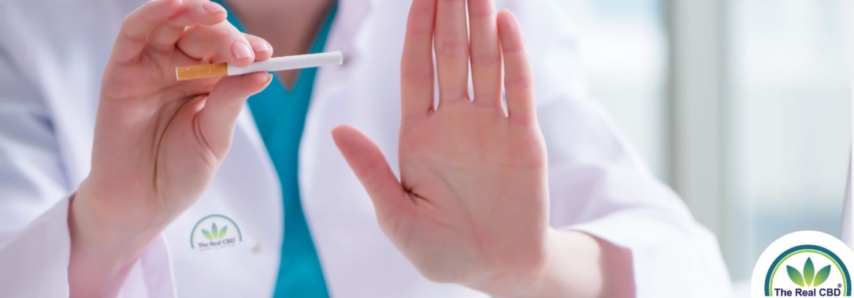 Doctor holding a cigarette asking to stop