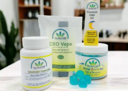 CBD sleep products on a wood table top in a shop - The Real CBD Brand