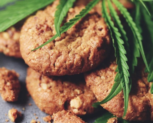 Cookies with hemp leaves around