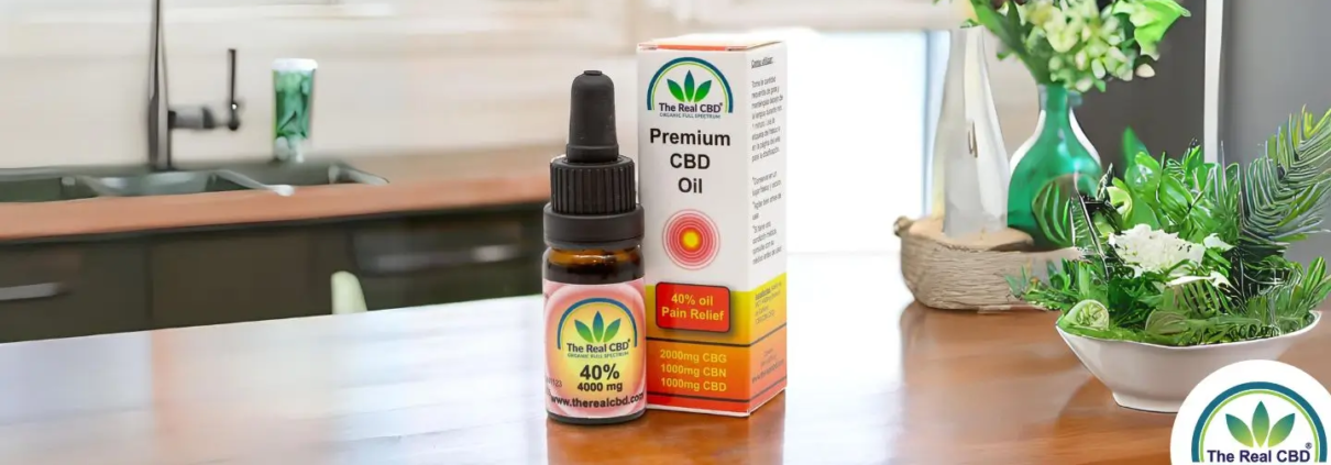 The Real CBD 40% CBD pain relief oil on a table-top