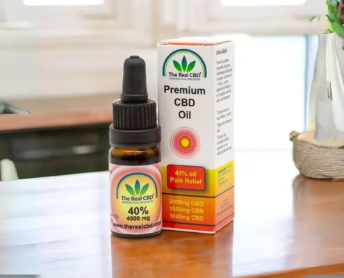 The Real CBD 40% CBD pain relief oil on a table-top