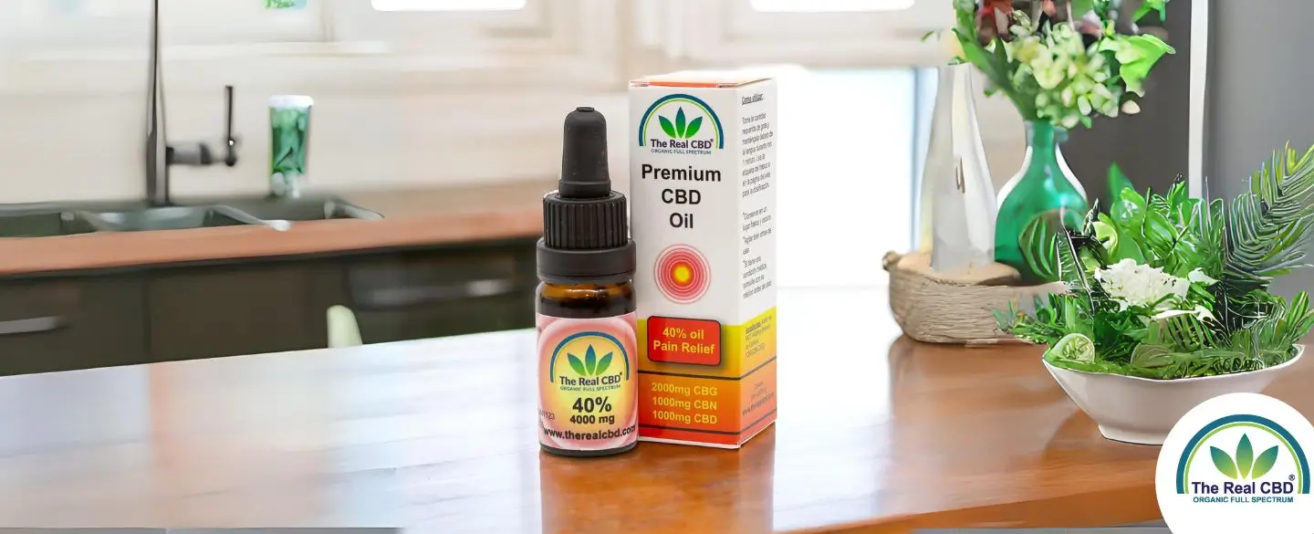 The Real CBD 40% CBD pain relief oil on a table-top