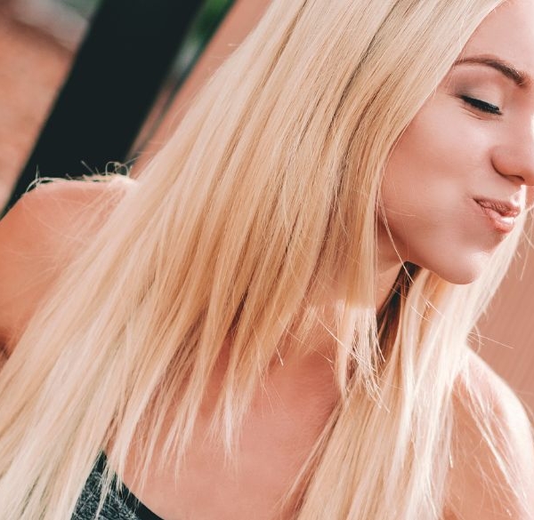 Blond woman enjoying some food