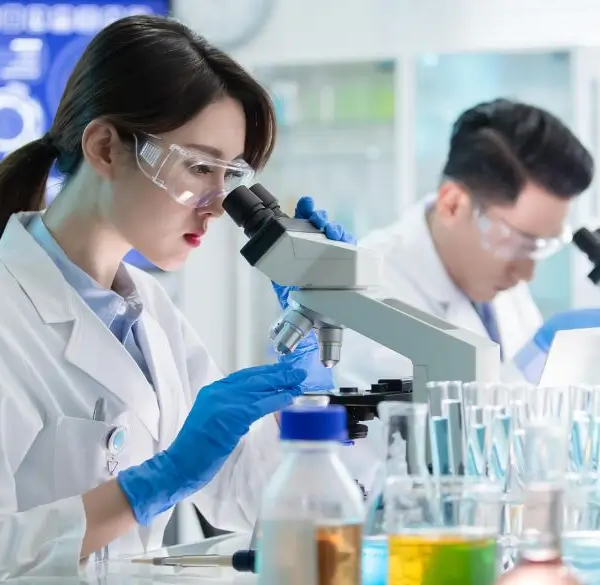 Scientists testing in a lab